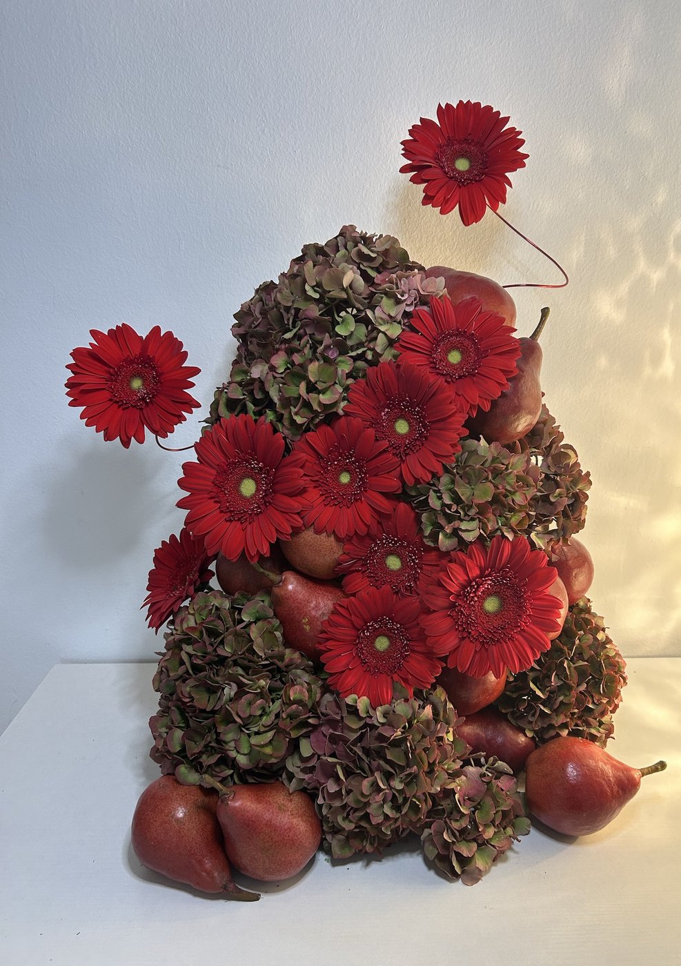 Gerbera, hydrangea and red pear tower